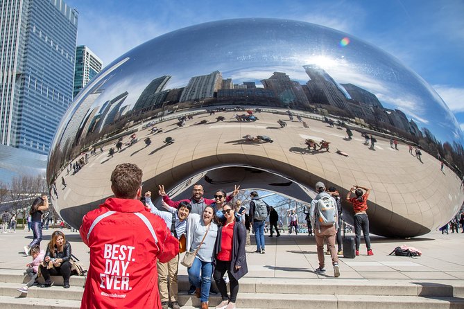 Chicago in a Day: Food, History & Architecture Walking Tour - Starting Under the Chicago Theatre Marquee: quick orientation, big-city energy